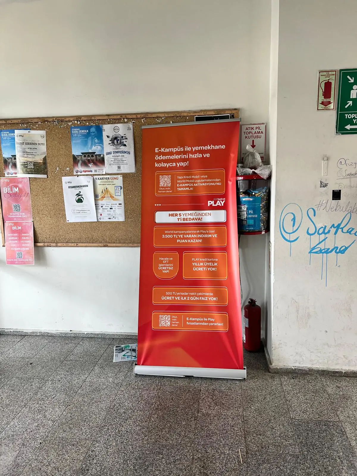 Roll-up banner standing in a building entrance